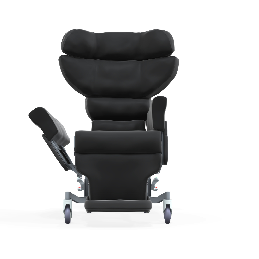 A front view of the Accora Configura® Advance Postural Tilt Chair in modern black, featuring padded support and an elevated leg rest—an adaptable reclining wheelchair designed for superior comfort and postural care.
